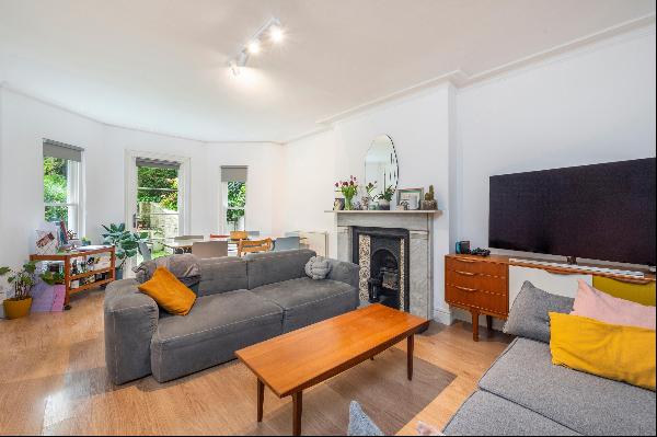 A 3 bedroom flat for sale on Adamson Road, NW3.