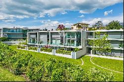 Collina d'Oro-Gentilino: elegant terraced villa with private garden for sale