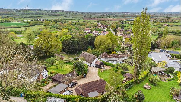 A charming thatched period property, surrounded by delightful gardens and with 800sqft of 