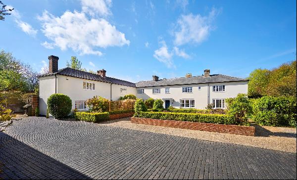 A contemporary development opportunity set alongside a pair of elegant period homes