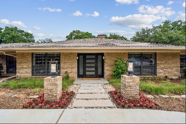 Warm and Inviting Ranch Style Home with Meticulous Upgrades and Lush Landscaping