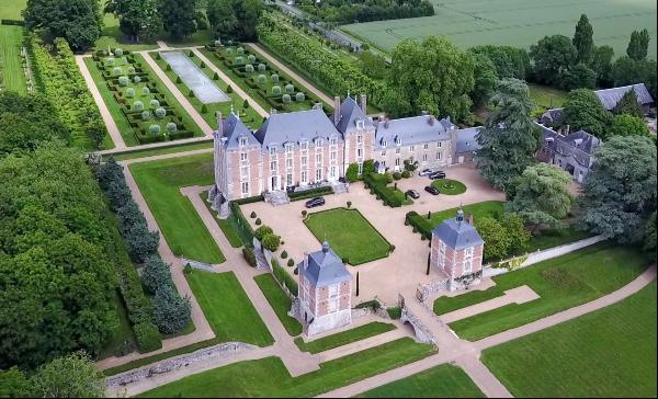 An exceptional listed Louis XIII style chateau set in 40 enclosed hectares with formal Fr