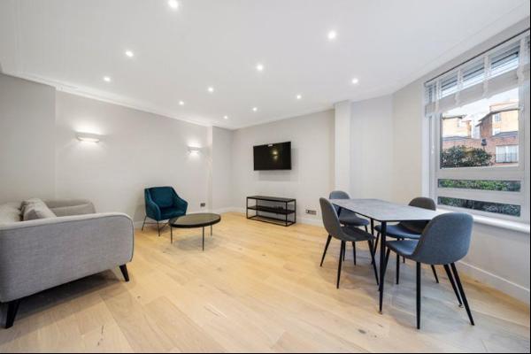 A bright recently refurbished apartment in a modern purpose built portered block.