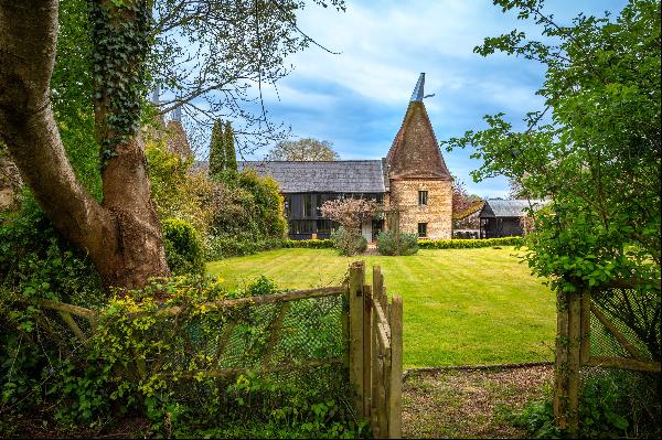 A substantial portion of a historic Grade II Listed Oast House complete with a detached an