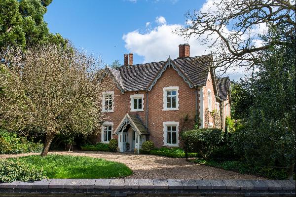 A handsome detached five-bedroom edge of village house with lovely gardens and grounds, tw