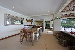 House with a view of the sunset and a private deck