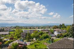 Green, family setting for this property with building potential