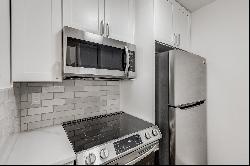 Turnkey Condo in Beautiful Historic Brick Building in the Heart of Midtown