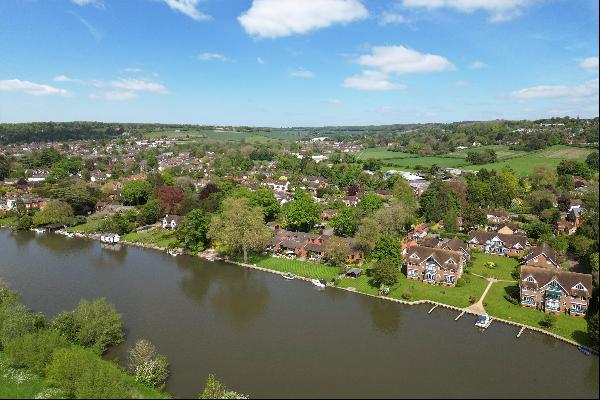 A stunning riverside home with beautiful views across the Thames to National Trust land be