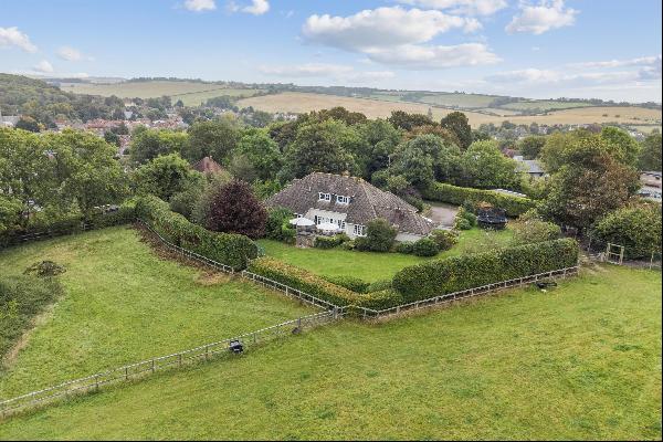 A fantastic edge of the village family house with land and exceptional views.