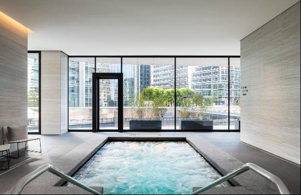 A modern one-bedroom apartment with views across Canary Wharf.