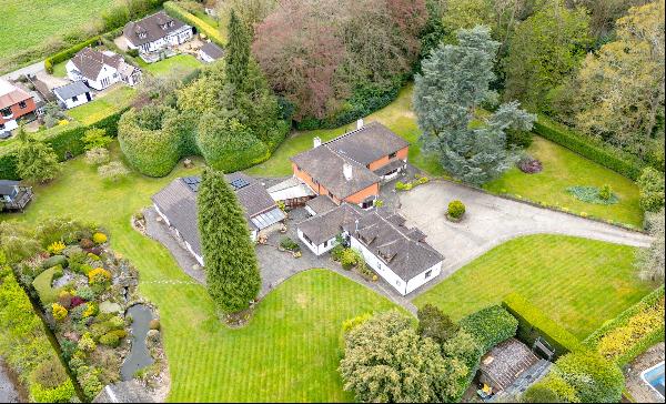 A substantial family house set in cultivated gardens and with an indoor swimming pool; ide