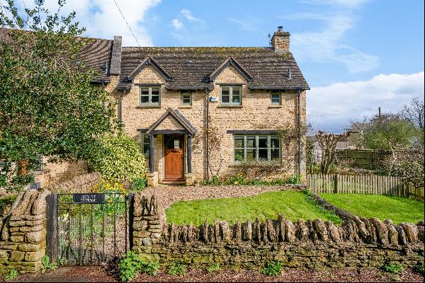 A delightful three-bedroom cottage in sought after Cotswold village with countryside views