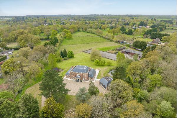 A six bedroom detached home with equestrian facilities and approximately 21 acres.