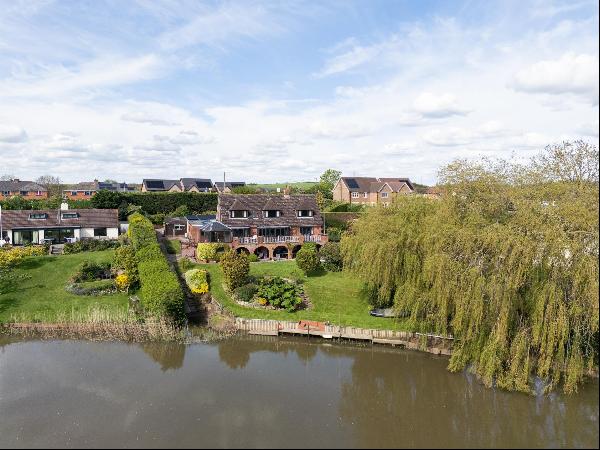 A most lovely detached house with river frontage and mooring and stunning south-facing vie