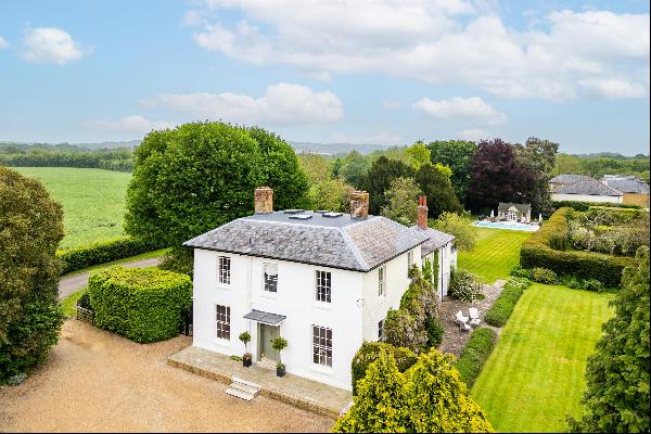 An extremely elegant, recently restored grade ll listed Georgian seven bedroom family home