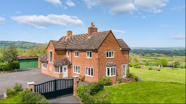 A detached country house with land and spectacular views.