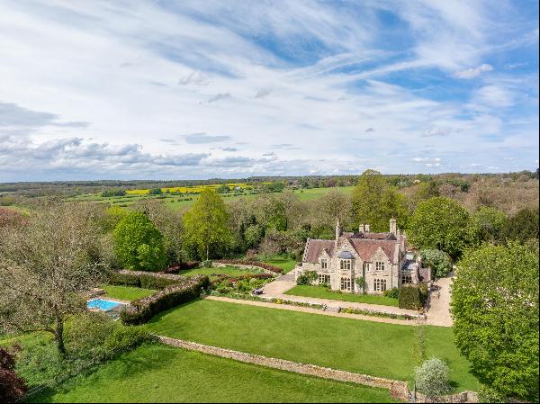 An impressive Grade II listed Cotswold country house, recently refurbished, in a wonderful
