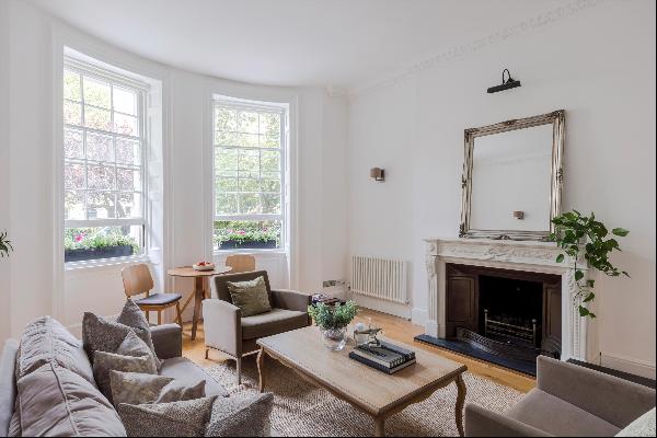 A beautifully presented apartment located in a well maintained period building on one of M