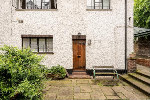 A two bedroom house located in a secluded private courtyard behind Alexander Place