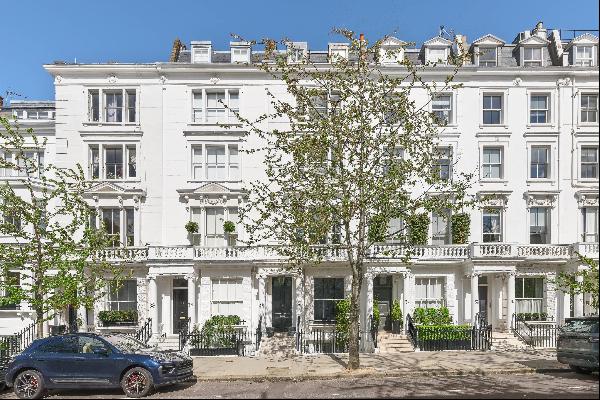 A superb family house on Palace Gardens Terrace, with an exceptional garden.