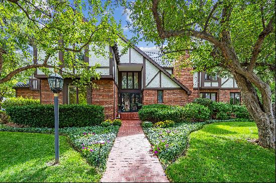  Beautiful English Tudor-style Home Nestled Along Prestigious Polo Field Lane!