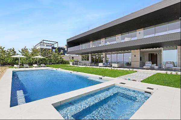 Located on one of the most coveted lanes in the Hamptons, welcome to 165 Surfside Drive - 