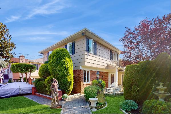 Enter into luxury with this Mini Castle in Douglaston, featuring 5 bedrooms and exquisite 