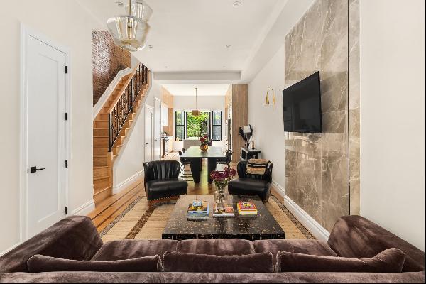 Discover the best of Brooklyn living in this breathtaking four-story brownstone spannin