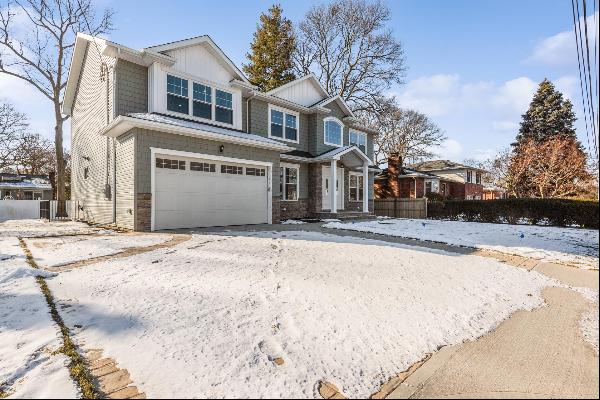 Spectacular New Construction with Stone Front and Mid Century Design. East Meadow School D