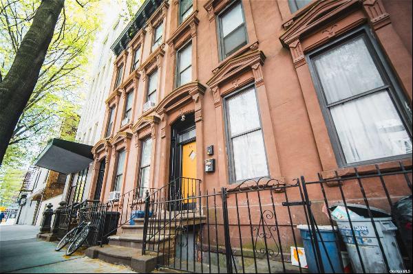Welcome to the heart of Brooklyn. (Brownstone Three-Family in Prime Downtown Location)  Th