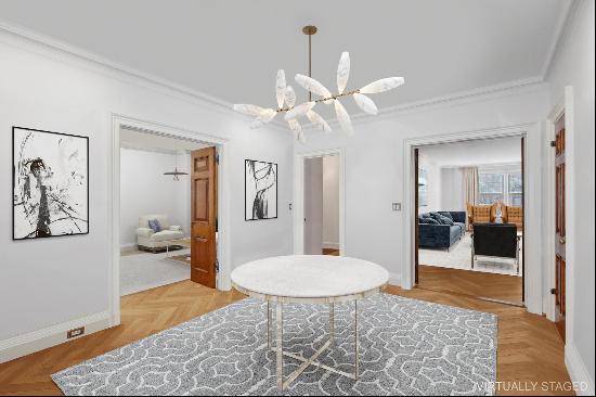 Welcome home to this quintessential Park Avenue 7-room charming pre-war residence with 