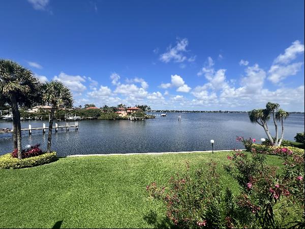 Experience luxury coastal living at its finest with this stunning two-story townhome boast