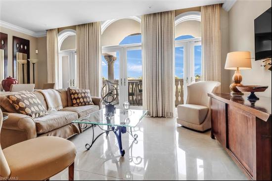 Nestled in the vibrant heart of downtown Naples on iconic 5th Avenue, this delightful 2-be