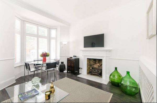 Attractive three-bedroom apartment available to rent on Edith Grove, SW10.