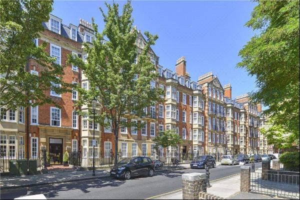 A beautifully presented four bedroom apartment with air-conditioning in arguably the best 