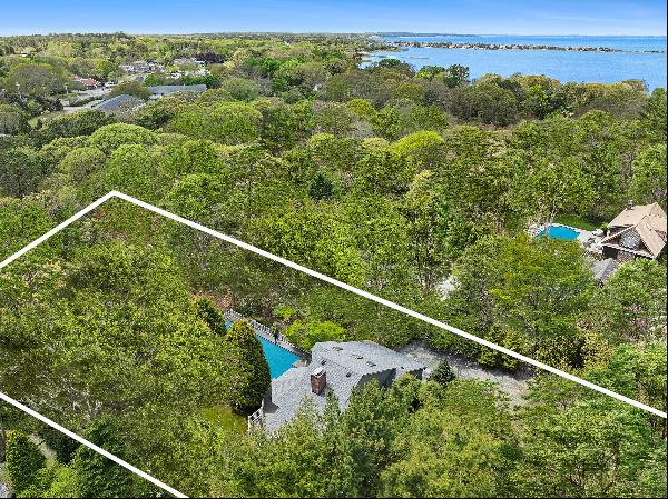 Located on a .76 acre lot,  across from a preserve and set far back off the road is this 4