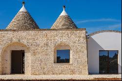 Bright lamia with trulli in the Itria Valley