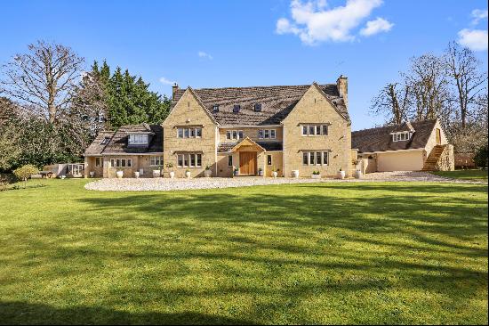 Located on the edge of the village, at the foot of the Cotswold escarpment, a substantial 