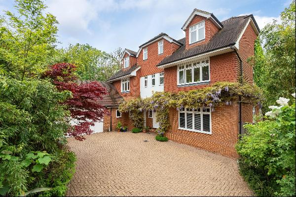 A 6 bedroom, 4 bathroom detached house located in a private gated development in a seclude