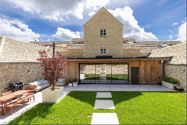 A stunning modern conversion with ancillary accommodation Cotswolds views and NO ONWARD CH