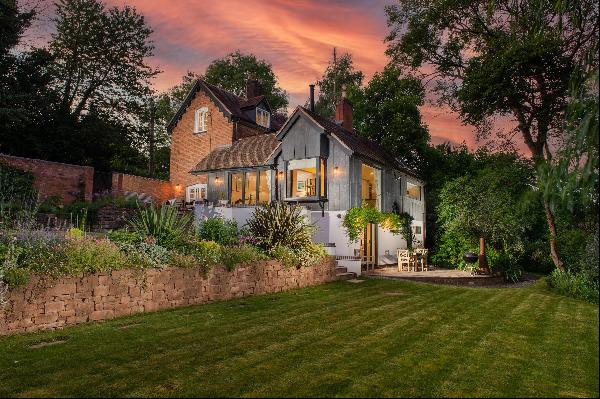 A charming 19th century house with contemporary additions, set in magical private gardens 