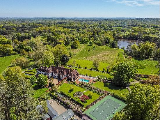 An outstanding example of a Grade ll listed, Arts and Crafts Country House in a magical se