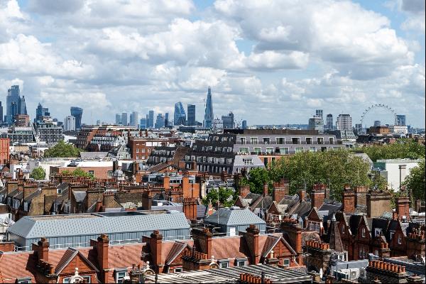 A light and spacious Mayfair penthouse with iconic views in a portered building