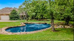 Two-acre wooded lot with outdoor oasis and private pond