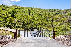 1.75 Acre Lot with Pineview Reservoir Views in a Gated Community!