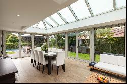 Detached house with pool nestled in greenery