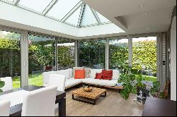 Detached house with pool nestled in greenery