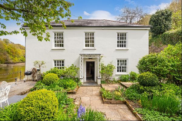 A gorgeous period house in an idyllic, waterside setting, with four bedrooms, three bath/s