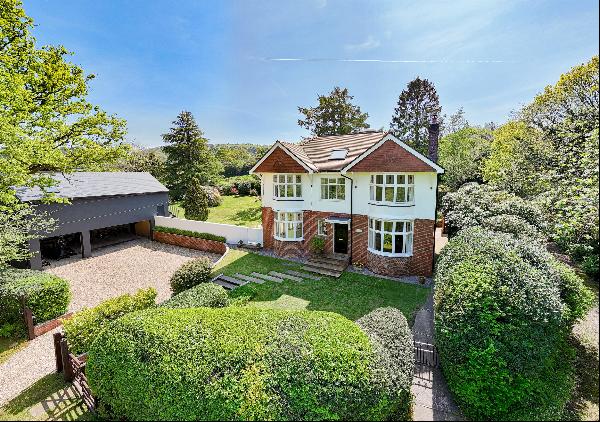 A stunning rural home with a detached triple garage and large, additional, flexible space 